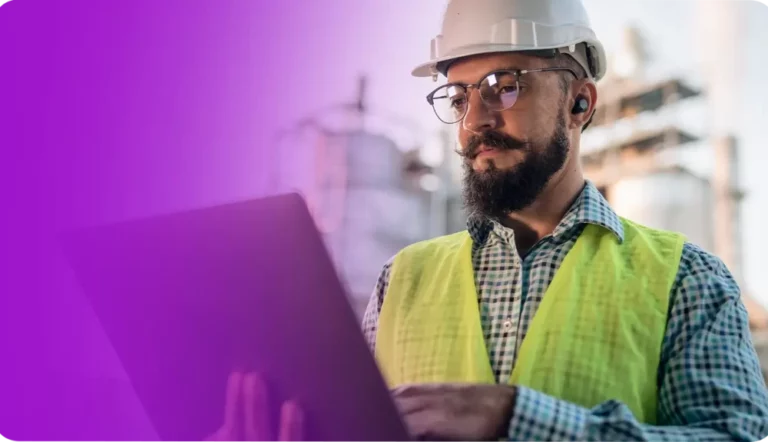 Person using tablet in hi-vis