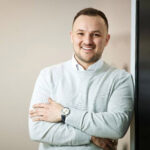 Mid-shot of SpecTec CEO Adam Dennett shot between discussing asset management for aging fleets.