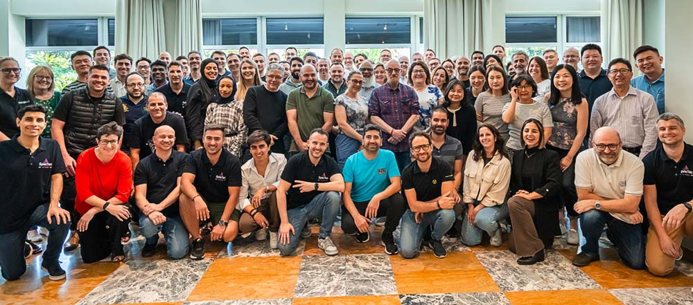 Landscape image of the global SpecTec team on the topic of 'our people'.